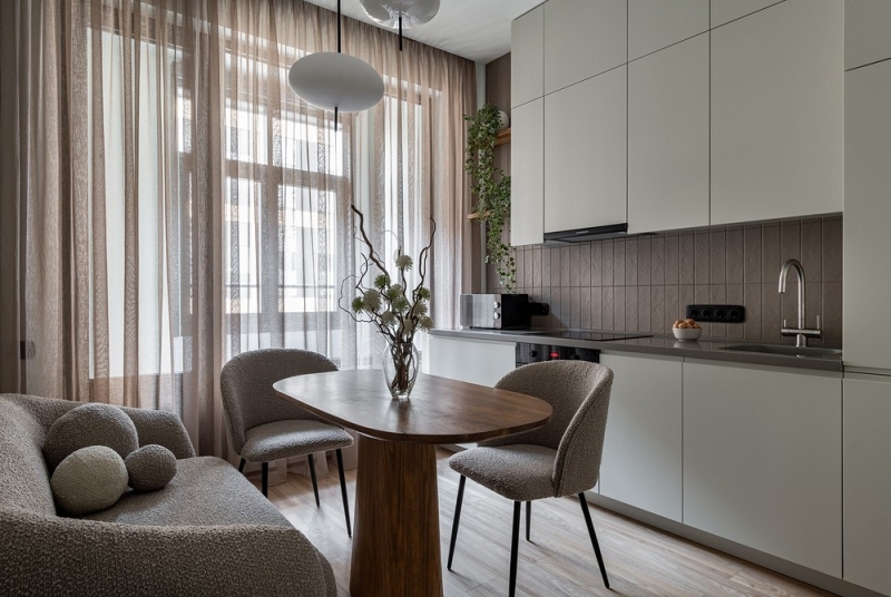 Аналог кухонного «уголка»: 6 дизайнерских кухонь с диванчиком вместо стульев