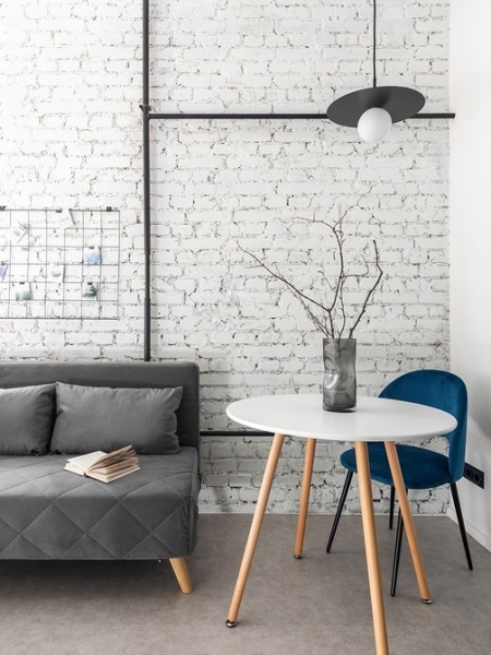 Как дизайнер увеличила площадь 20-метровых апартаментов в 1,5 раза и оформила визуально просторный интерьер