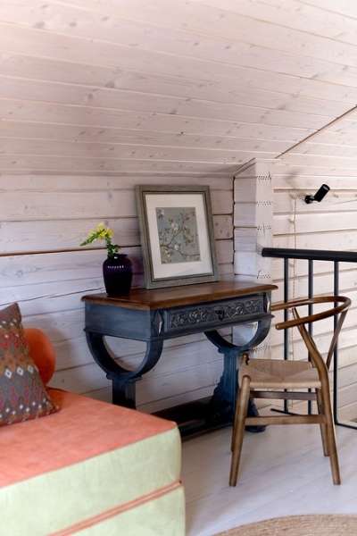 Как дизайнер оформила компактный домик 112 кв. м из бруса для семьи